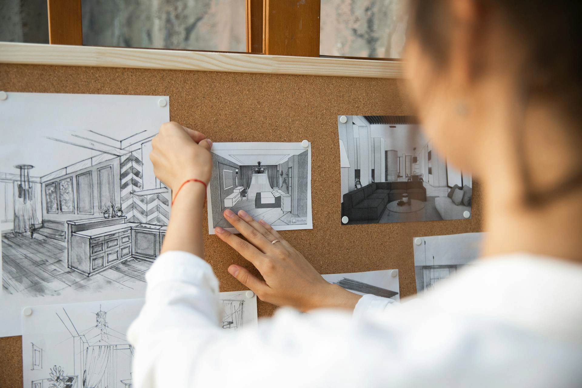 Drawn concept of a room pinned on a board